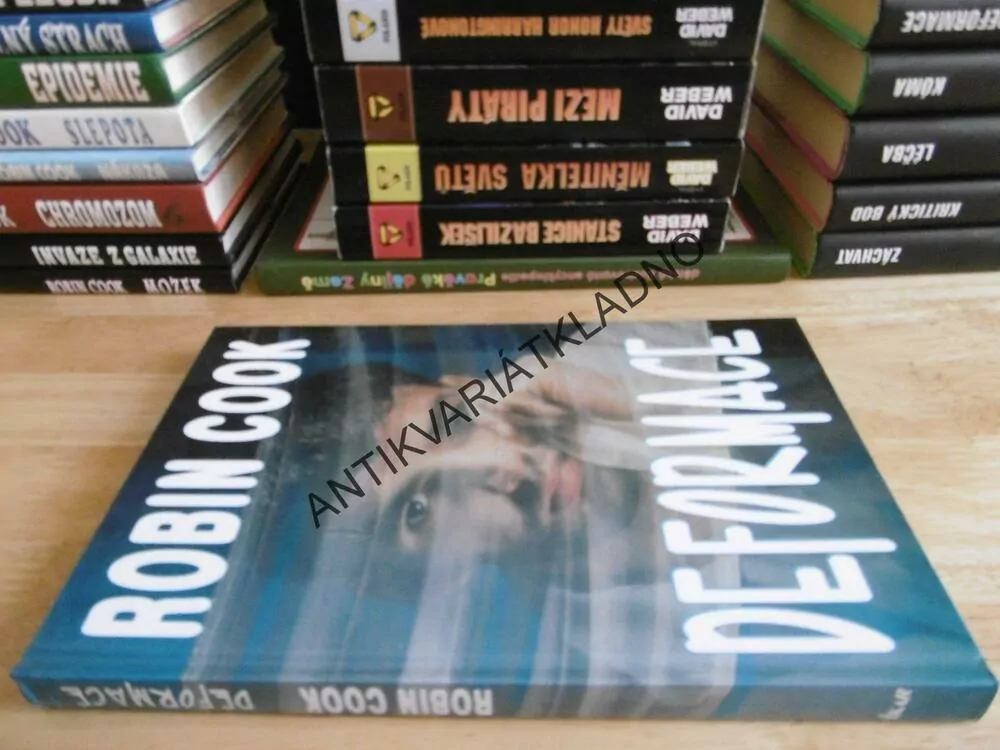 DEFORMACE, ROBIN COOK, **an