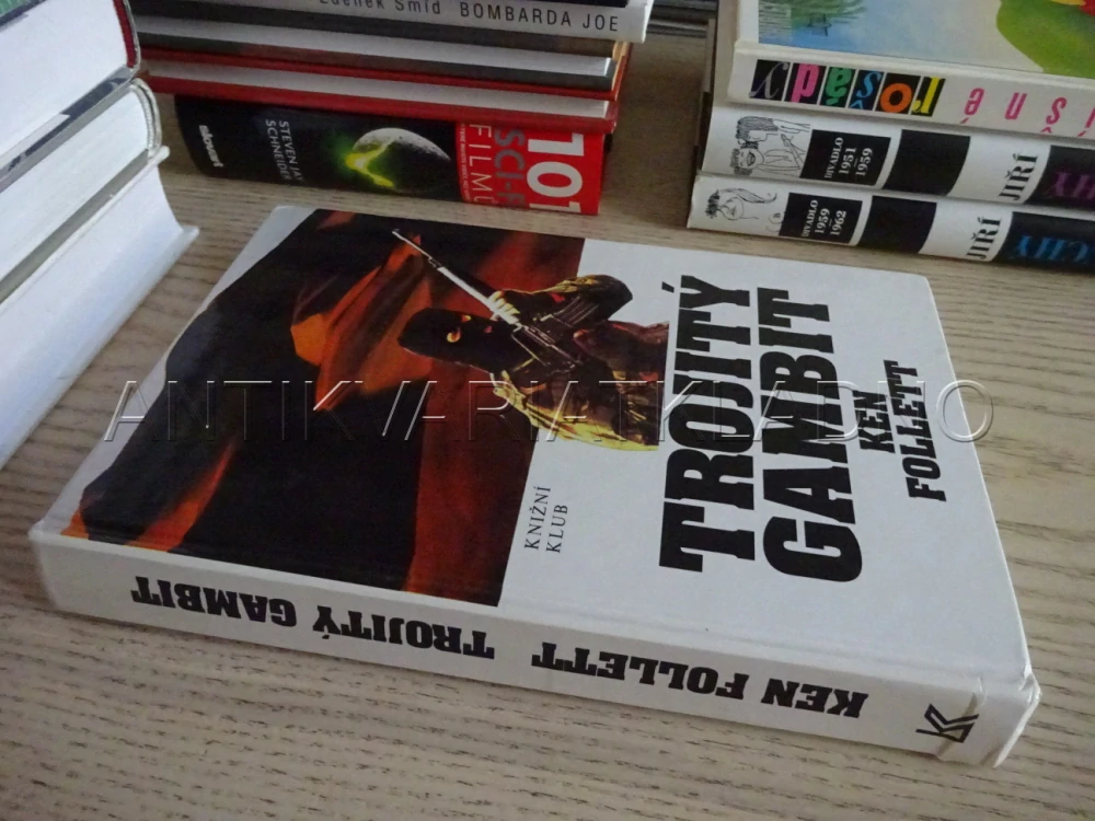 TROJITÝ GAMBIT, KEN FOLLETT, **an