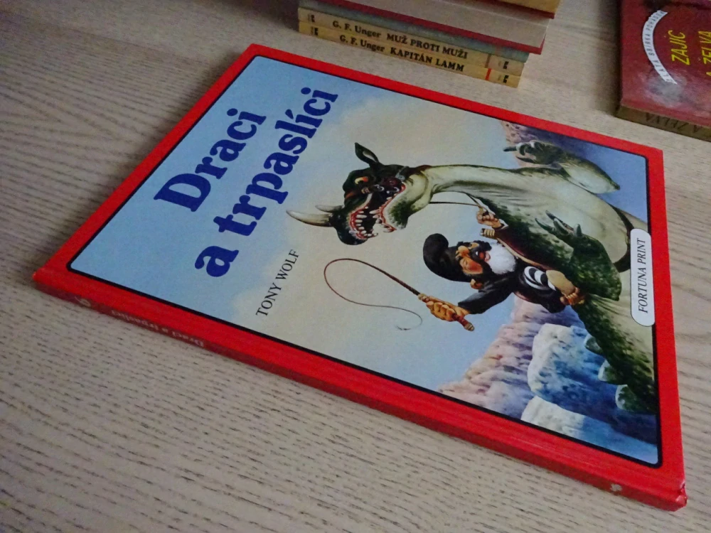 DRACI A TRPASLÍCI, TONY WOLF, **an
