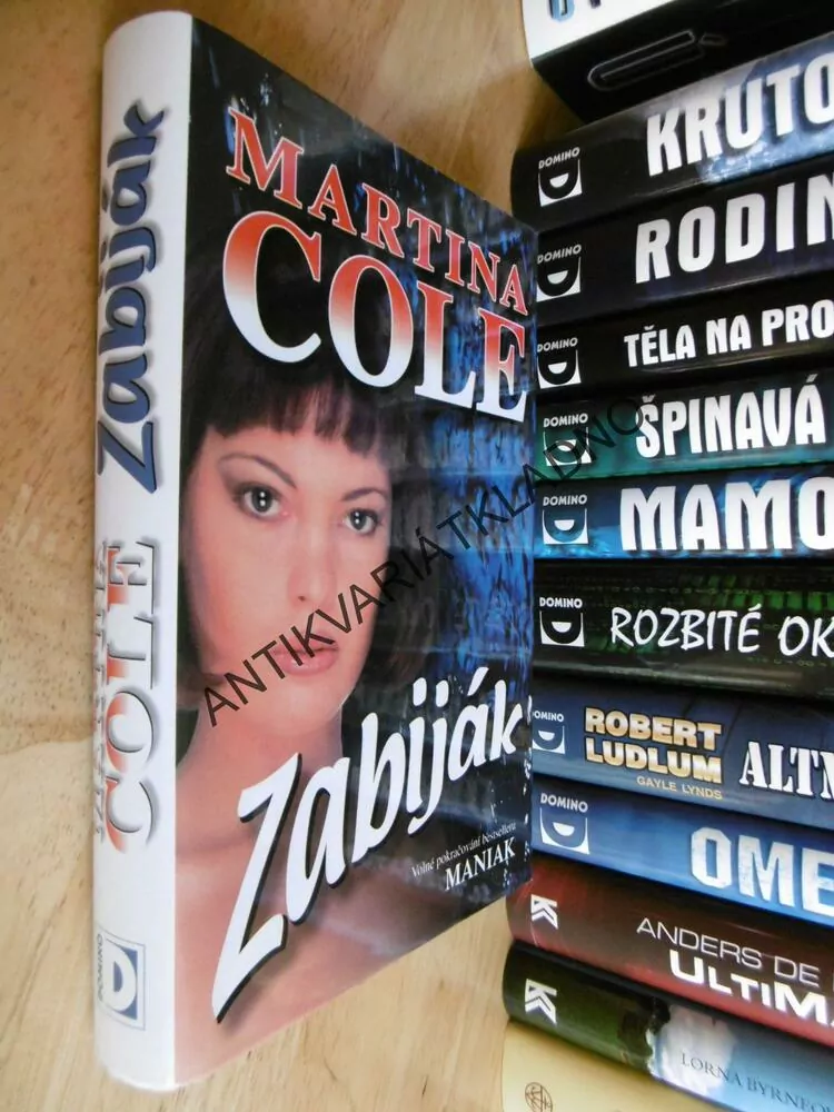 ZABIJÁK, MARTINA COLE, **an