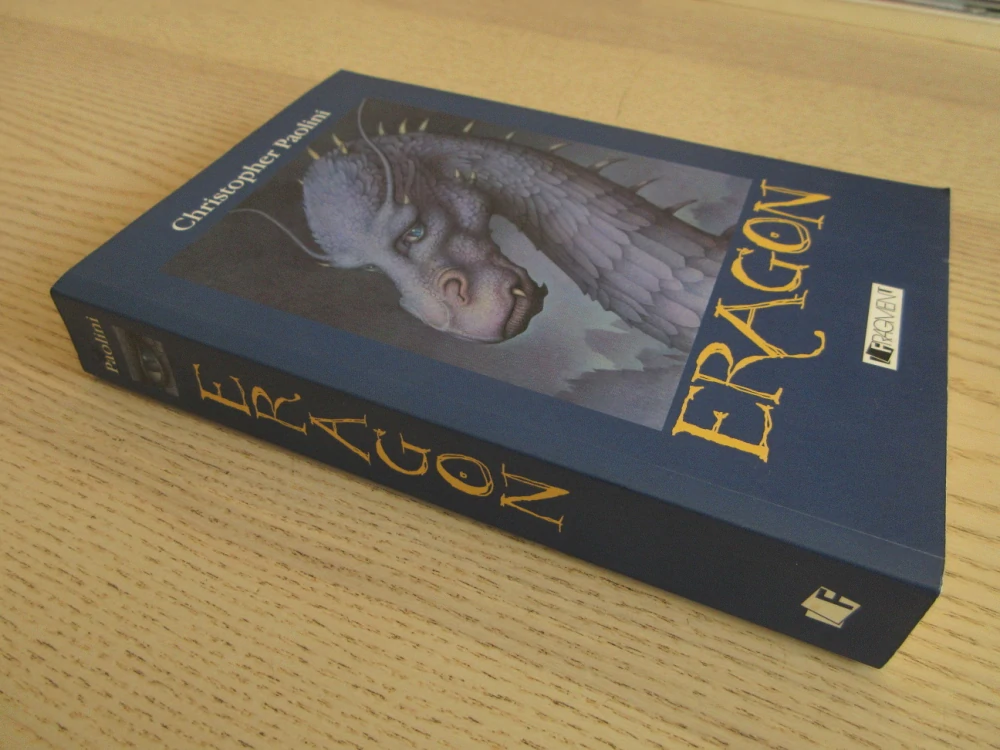 ERAGON, CHRISTOPHER PAOLINI, **an