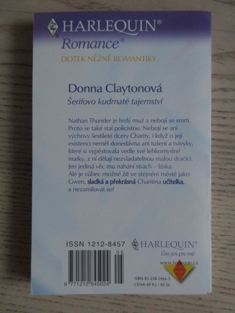 ŠERIFOVO KUDRNATÉ TAJEMSTVÍ, DONNA CLAYTONOVÁ, **an