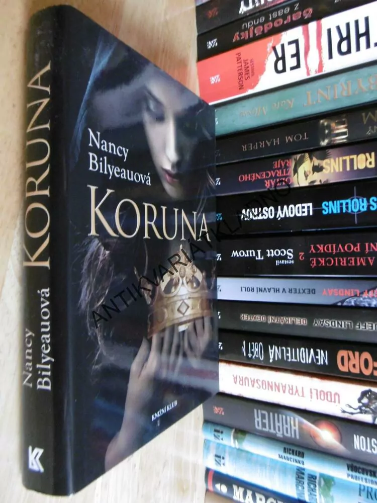 KORUNA, NANCY BILYEAUOVÁ, **an