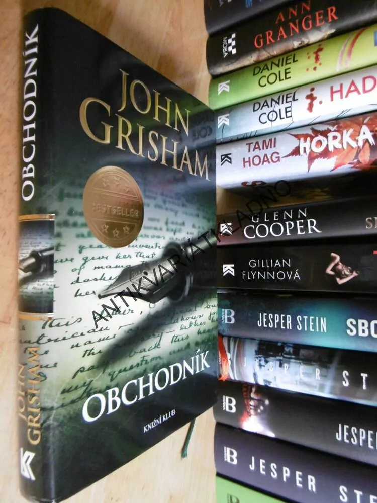 OBCHODNÍK, JOHN GRISHAM, **an