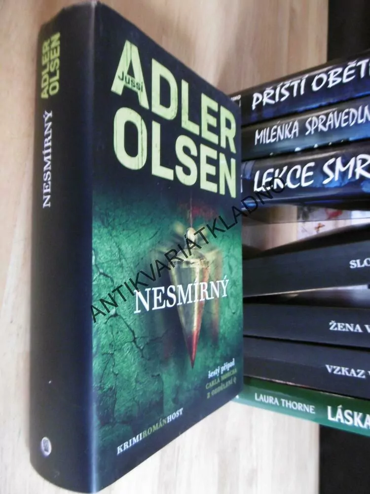 NESMÍRNÝ, ADLER OLSEN, **an