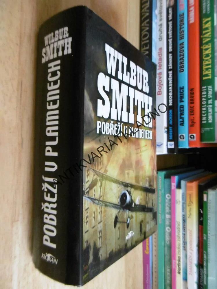 POBŘEŽÍ V PLAMENECH, WILBUR SMITH, **an
