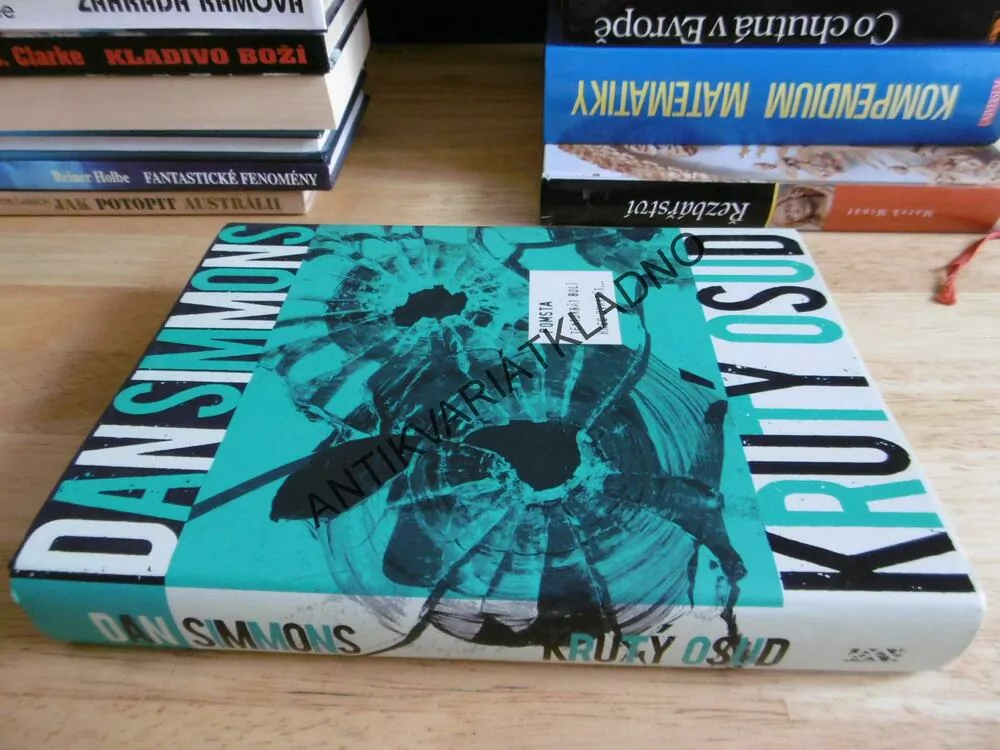KRUTÝ OSUD, DAN SIMMONS,