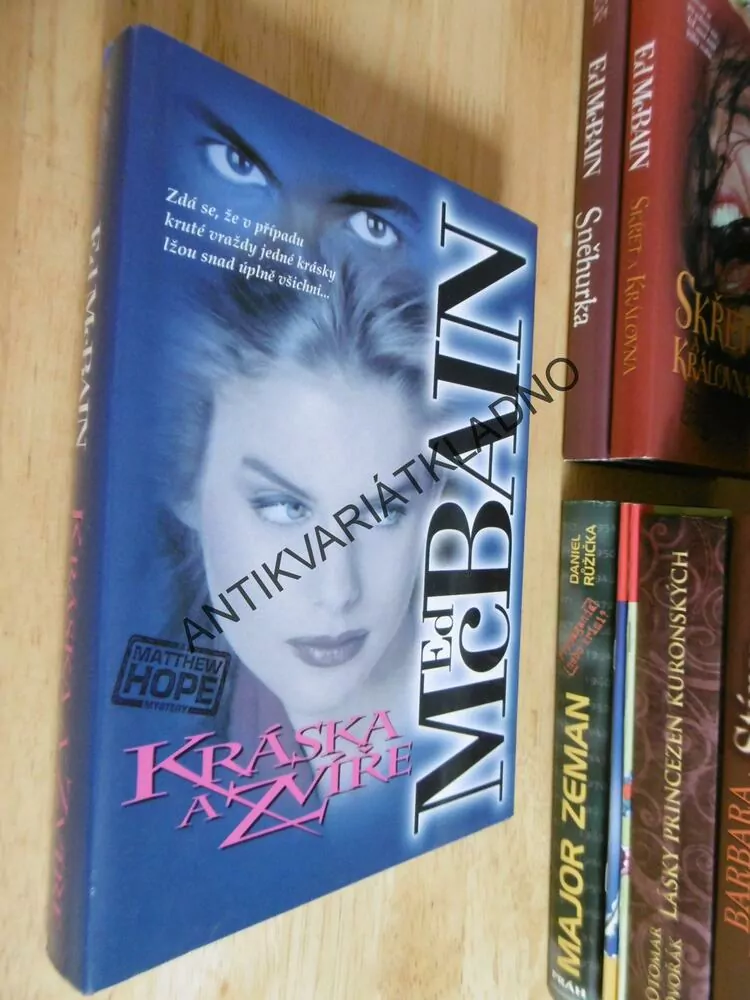 KRÁSKA A ZVÍŘE, ED MCBAIN, **an