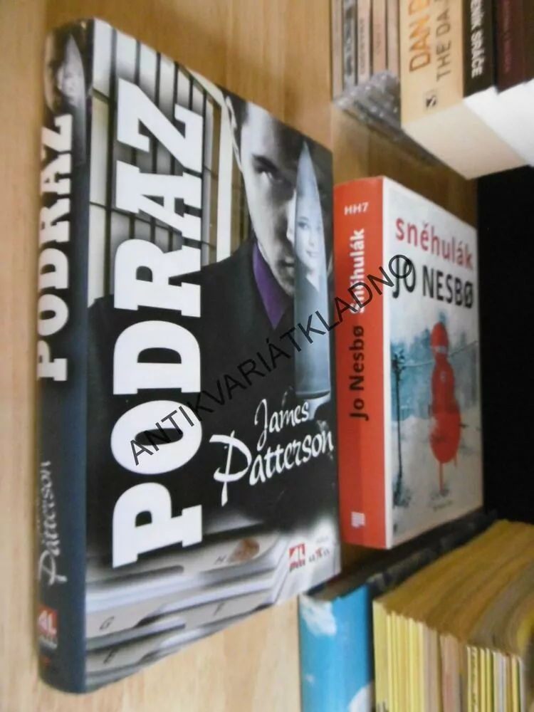 PODRAZ, JAMES PATTERSON, **an
