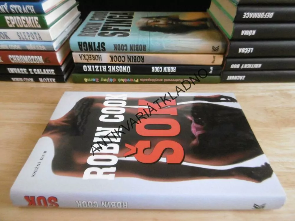 ŠOK, ROBIN COOK, **an