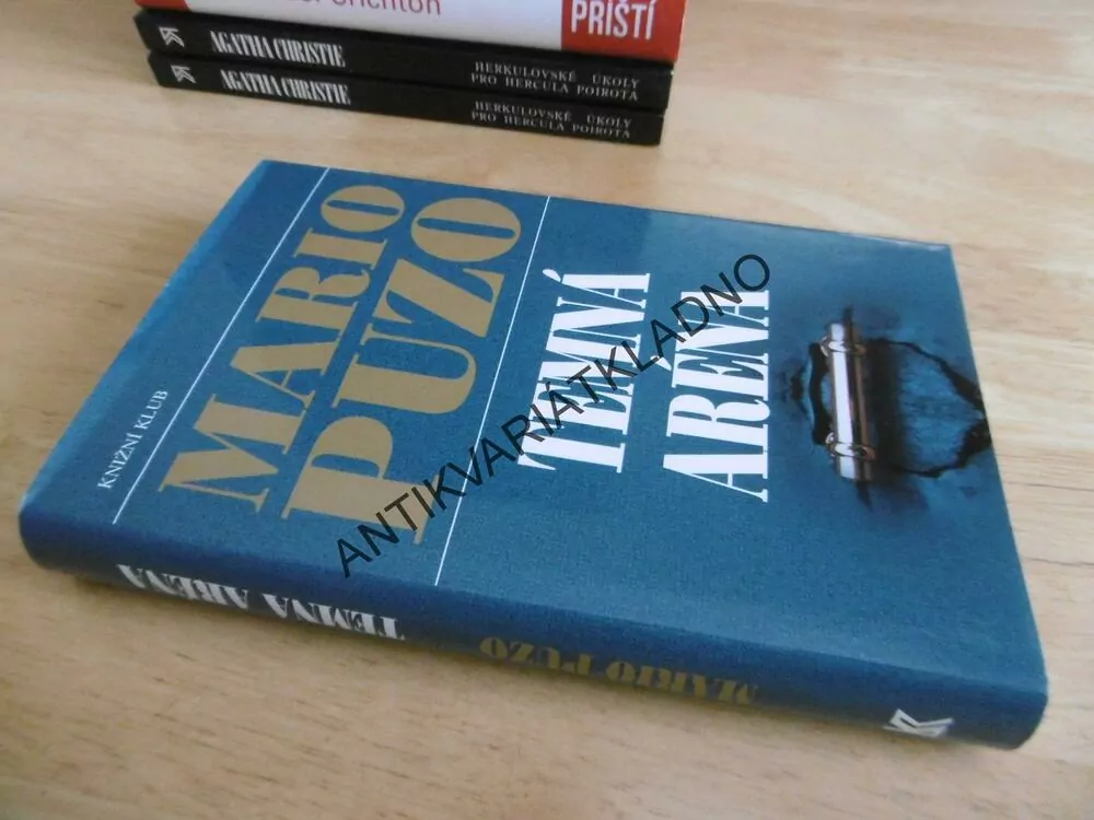 TEMNÁ ARÉNA, MARIO PUZO, **an