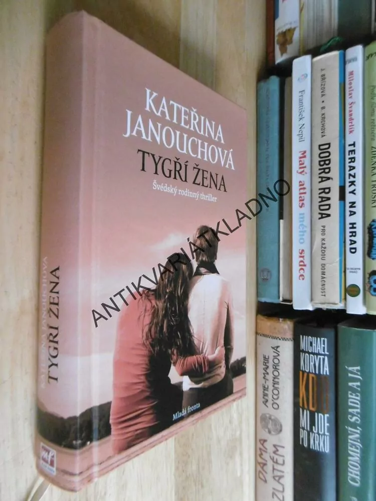 TYGŘÍ ŽENA, KATEŘINA JANOUCHOVÁ, **an