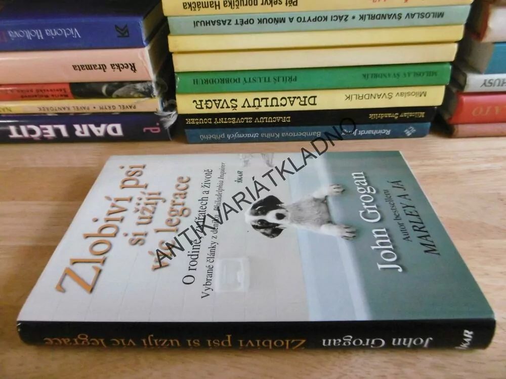 ZLOBIVÍ PSI SI UŽIJÍ VÍC LEGRACE, JOHN GROGAN, **an