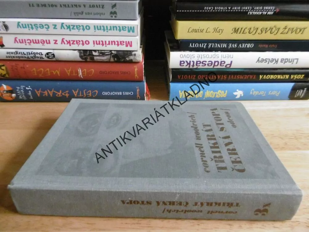 TŘIKRÁT ČERNÁ STOPA, CORNELL WOOLRICH, **an