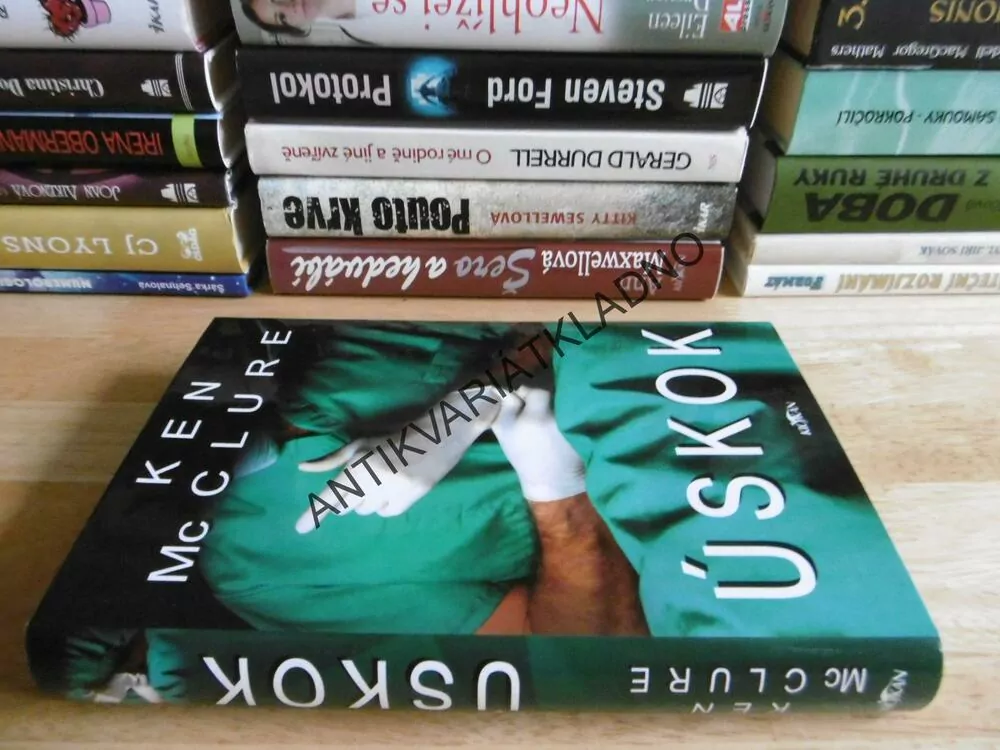 ÚSKOK, KEN MCCLUR, **an