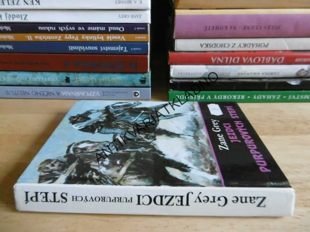 JEZDCI PURPUROVÝCH STEPÍ, ZANE GREY, **an
