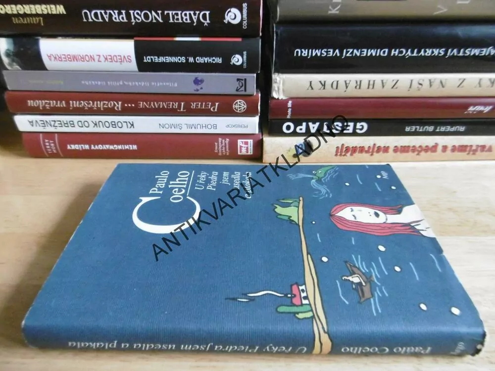 U ŘEKY PIEDRA JSEM USEDLA A PLAKALA, PAULO COELHO, **an