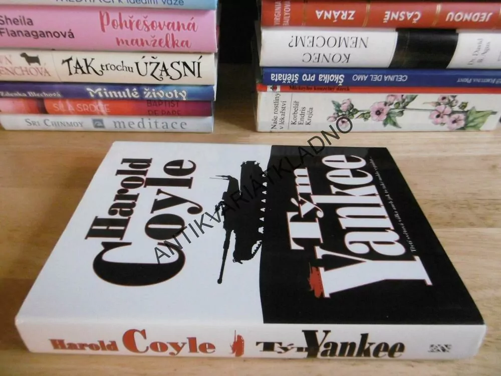 TÝM YANKEE, HAROLD COYLE, **an