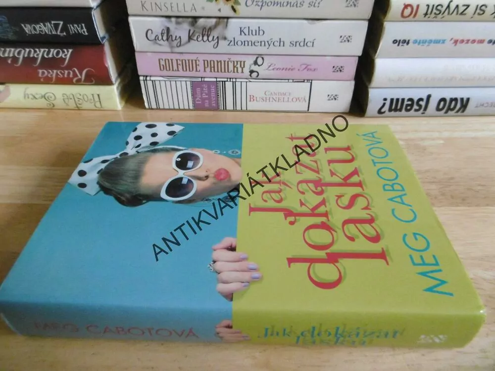 JAK DOKÁZAT LÁSKU, MEG CABOTOVÁ, **an