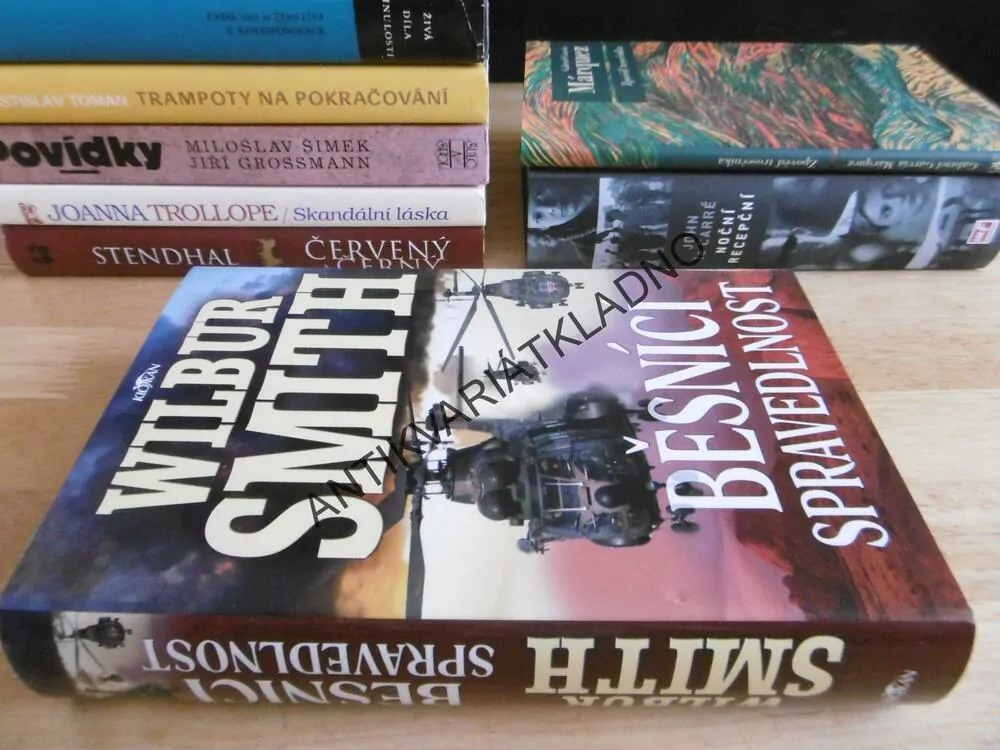 BĚSNÍCI SPRAVEDLNOST, WILBUR SMITH, **an