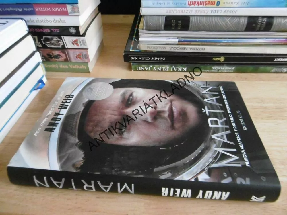 MARŤAN, ANDY WEIR, **an