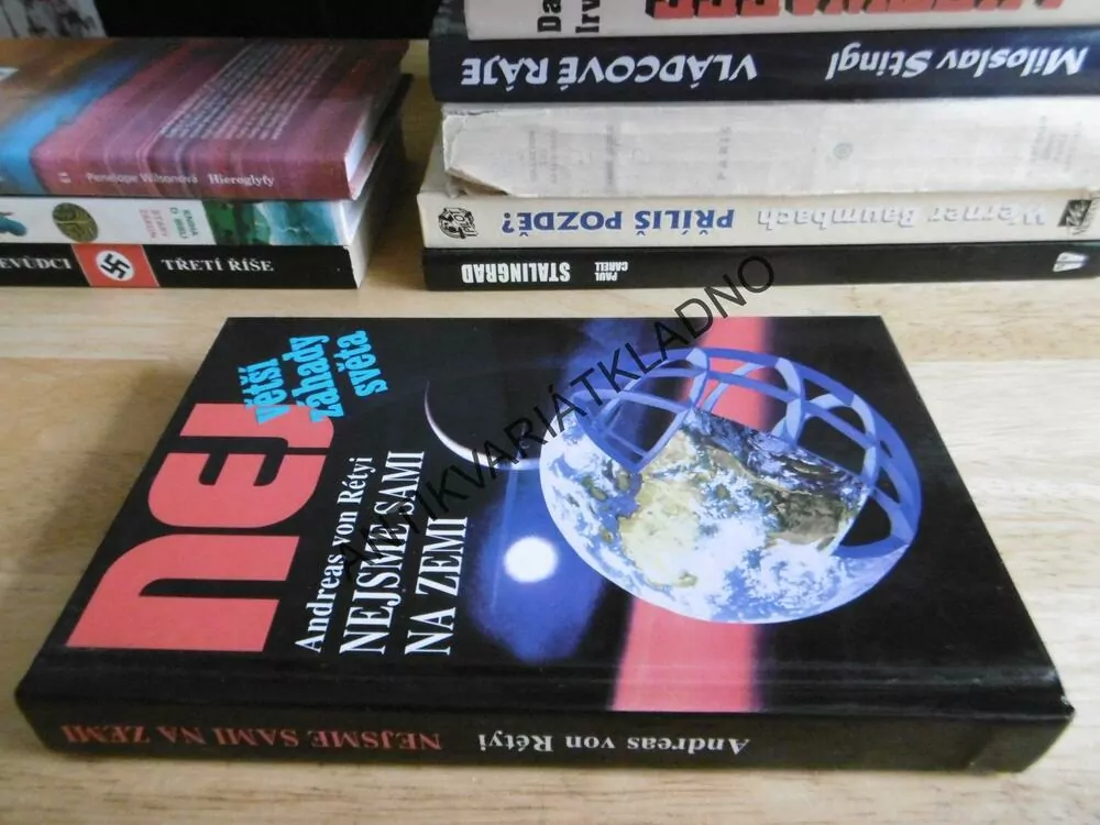 NEJSME SAMI NA ZEMI, ANDREAS VON RÉTYI, **an