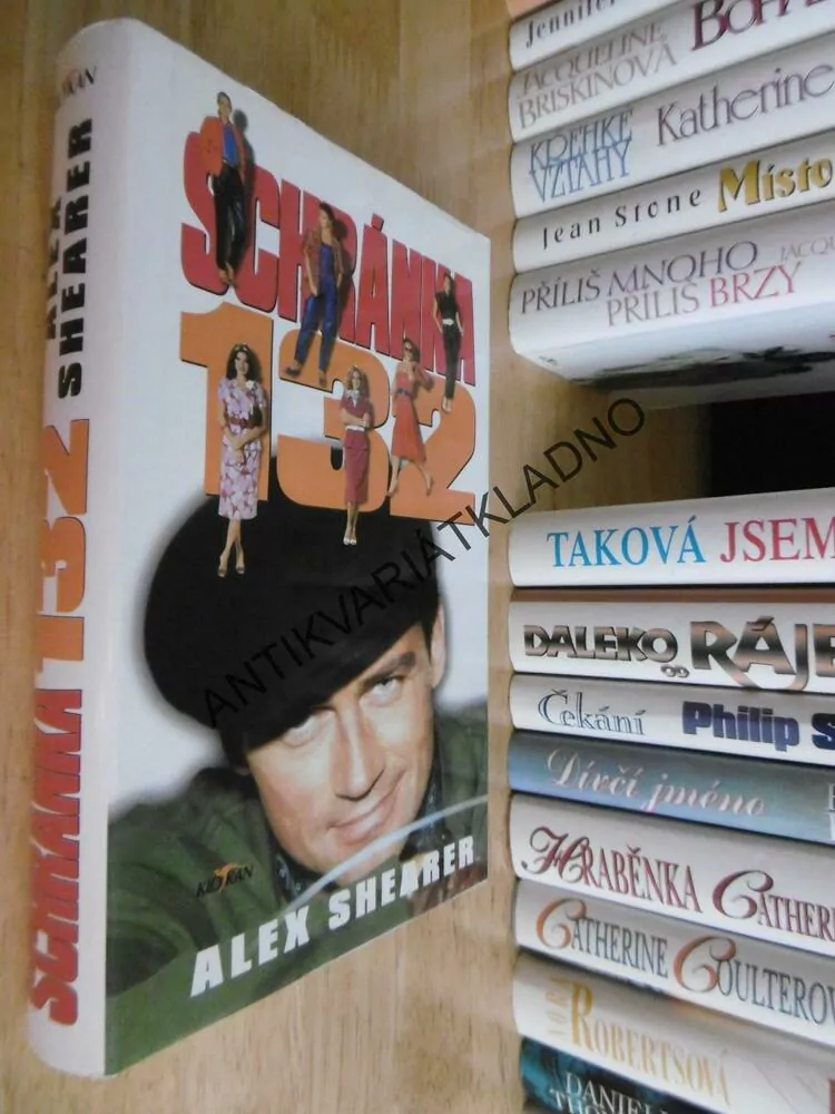 SCHRÁNKA 132, ALEX SHEARER, **an