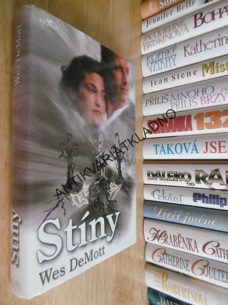 STÍNY, WES DEMOTT, **an