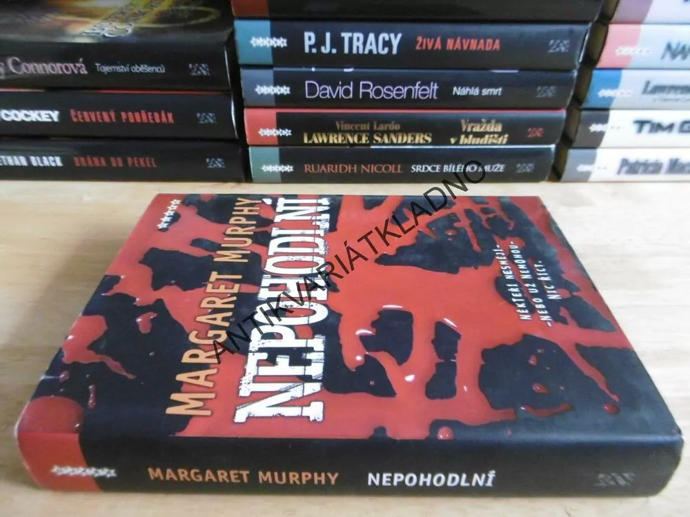 NEPOHODLNÍ, MARGARET MURPHY, **an