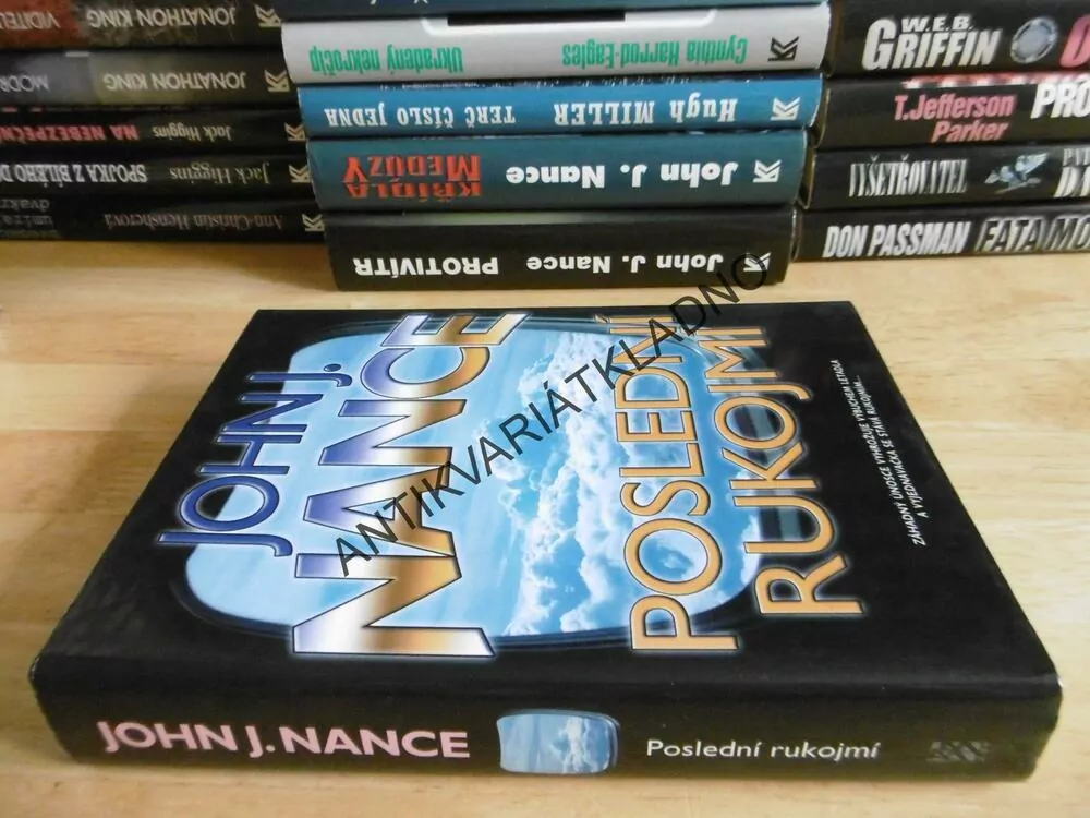 POSLEDNÍ RUKOJMÍ, JOHN J. NANCE, **an