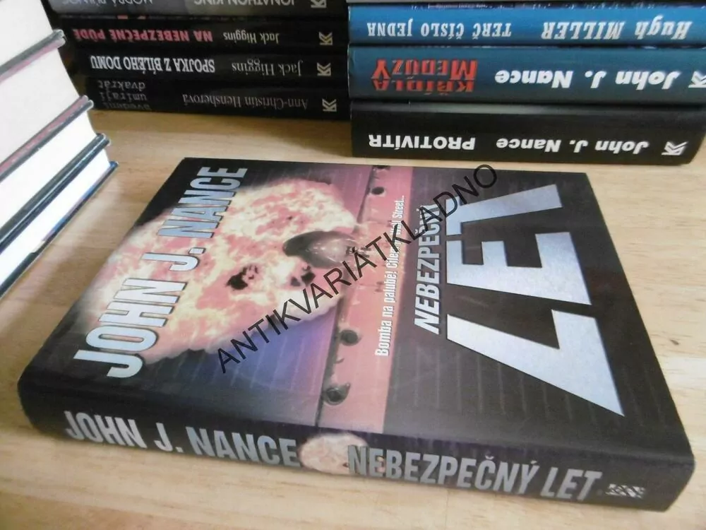 NEBEZPEČNÝ LET, JOHN J. NANCE, **an
