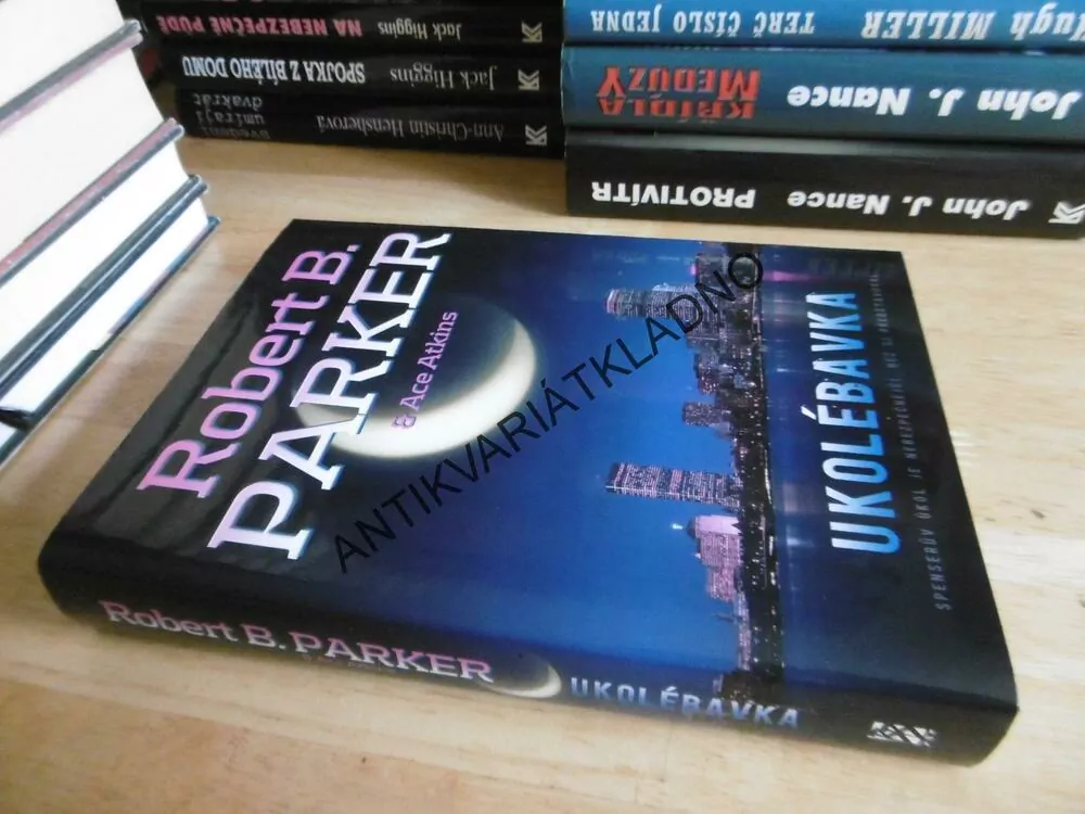 UKOLÉBAVKA, ROBERT B. PARKER, **an