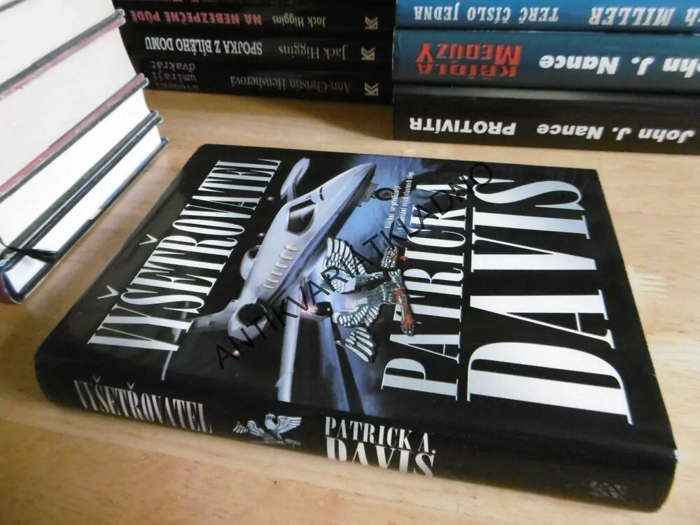 VYŠETŘOVATEL, PATRICK A. DAVIS, **an