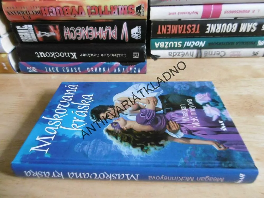 MASKOVANÁ KRÁSKA, MEAGAN MCKINNEYOVÁ, **an