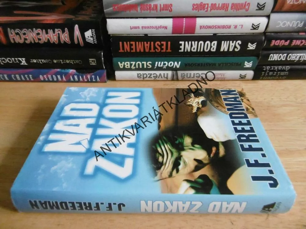 NAD ZÁKON, J. F. FREEDMAN, **an