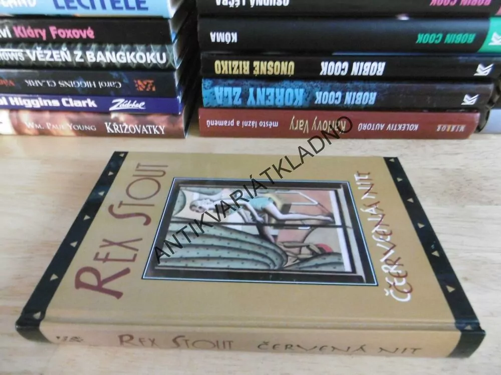 ČERVENÁ NIT, REX STOUT, **an