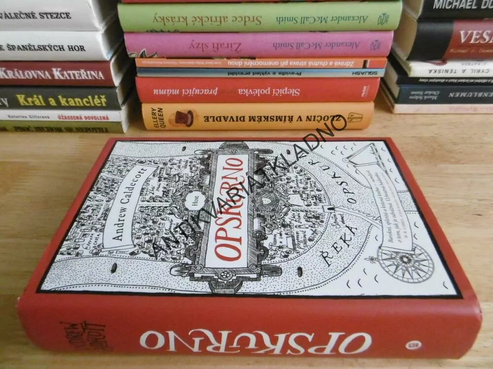 OPSKURNO, ANDREW CALDECOTT, **an