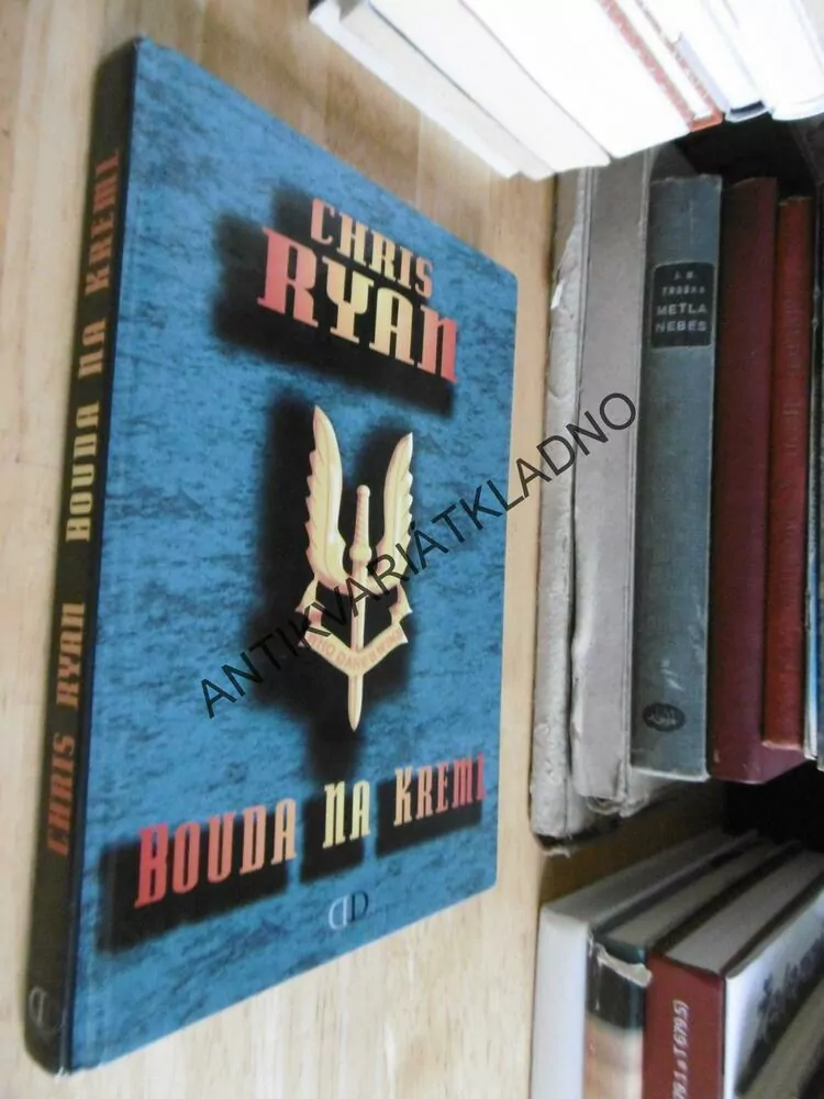 BOUDA NA KREML, CHRIS RYAN, **an