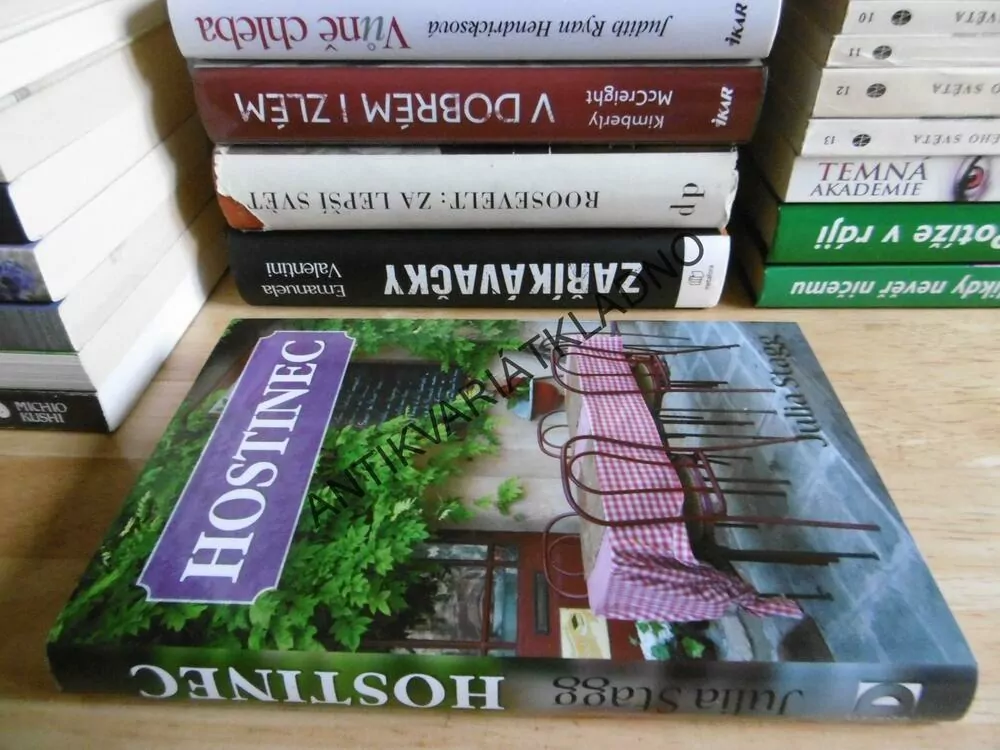 HOSTINEC, JULIA STAGG, **an