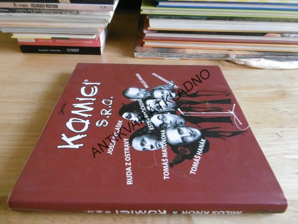 KOMICI S. R. O., **an