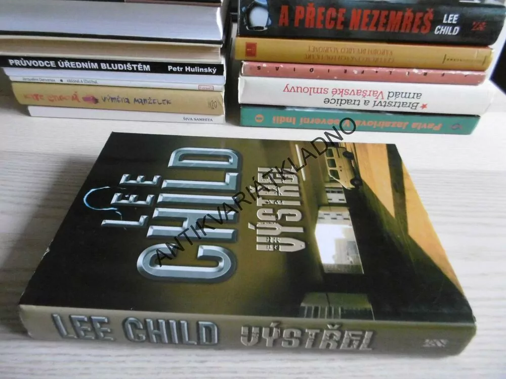 VÝSTŘEL, LEE CHILD, **an
