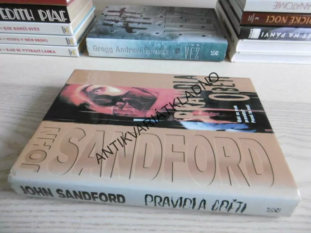 PRAVIDLA OBĚTI, JOHN SANDFORD, **an
