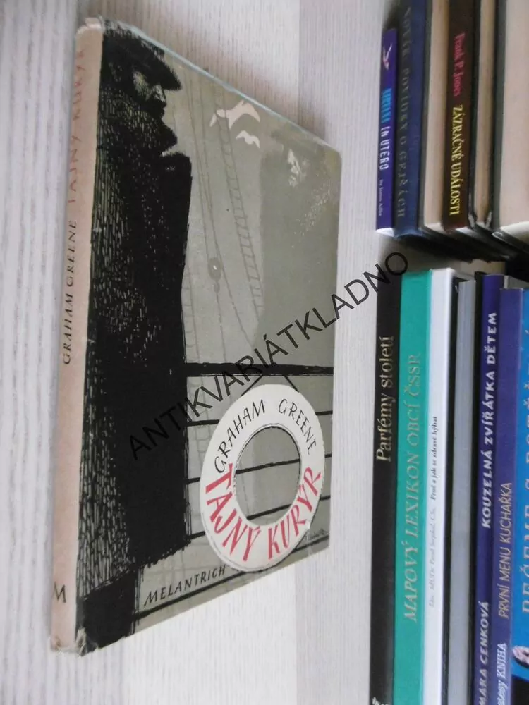 TAJNÝ KURÝR, GRAHAM GREENE, **an