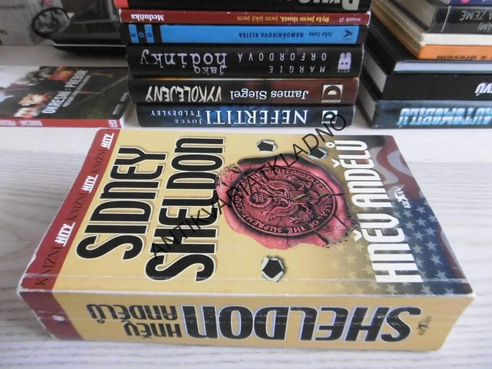 HNĚV ANDĚLŮ, SIDNEY SHELDON, **an
