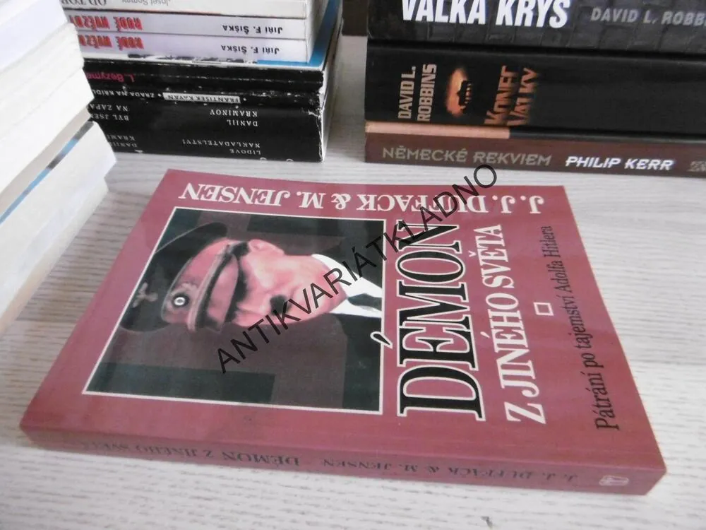 DÉMON Z JINÉHO SVĚTA, J. J. DUFFACK, M. JENSEN, **an