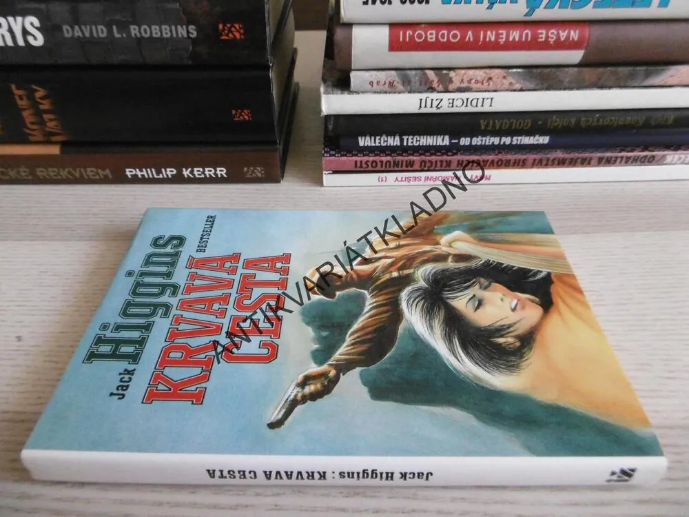 KRVAVÁ CESTA, JACK HIGGINS, **an 