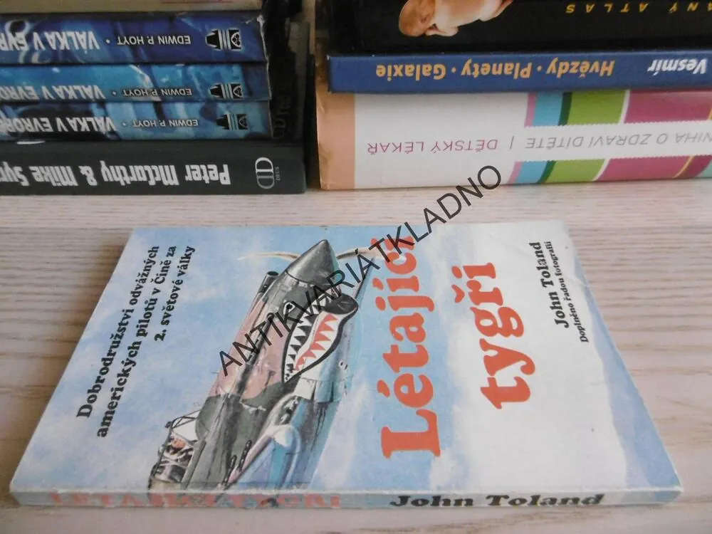 LÉTAJÍCÍ TYGŘI, JOHN TOLAND, **an