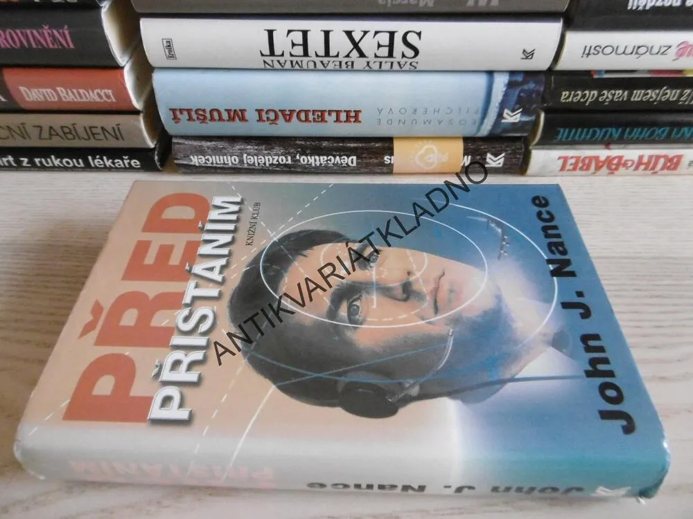 PŘED PŘISTÁNÍM, JOHN J. NANCE, **an