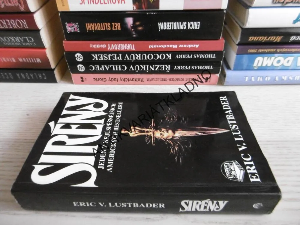SIRÉNY, ERIC LUSTBADER, **an