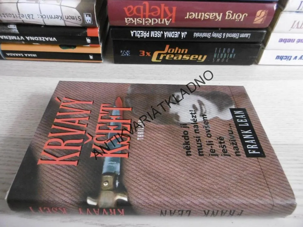 KRVAVÝ KŠEFT, FRANK LEAN, **an